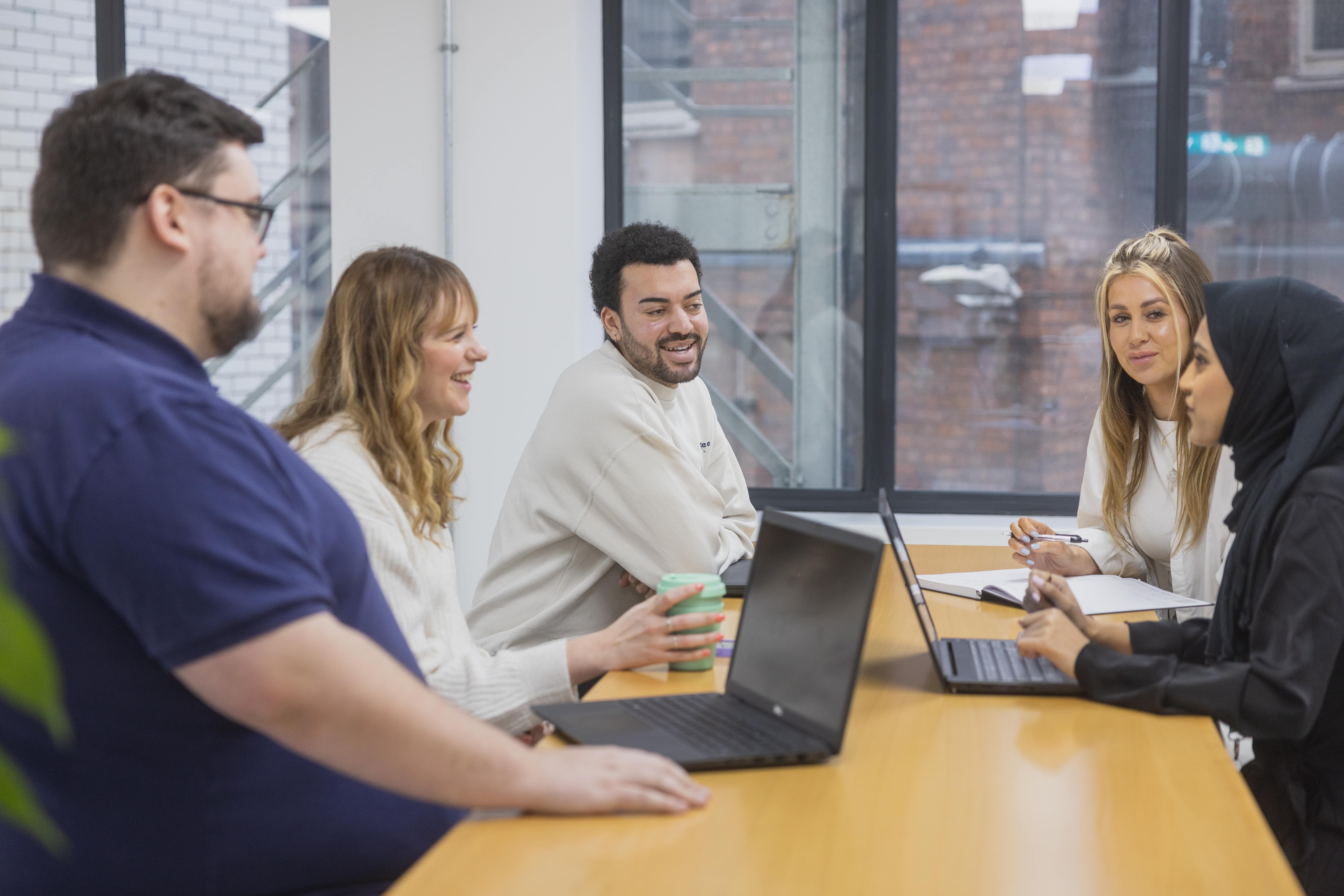 Recruitment Consultants in a team meeting